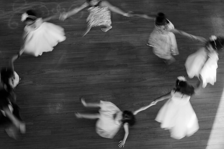 a group of girls dancing in a circle - San Antono Wedding Photographer - Philip Thomas