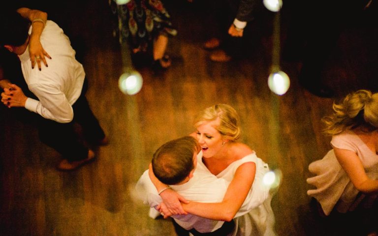 Couple dancing under the lights at The Gallery Houston wedding reception