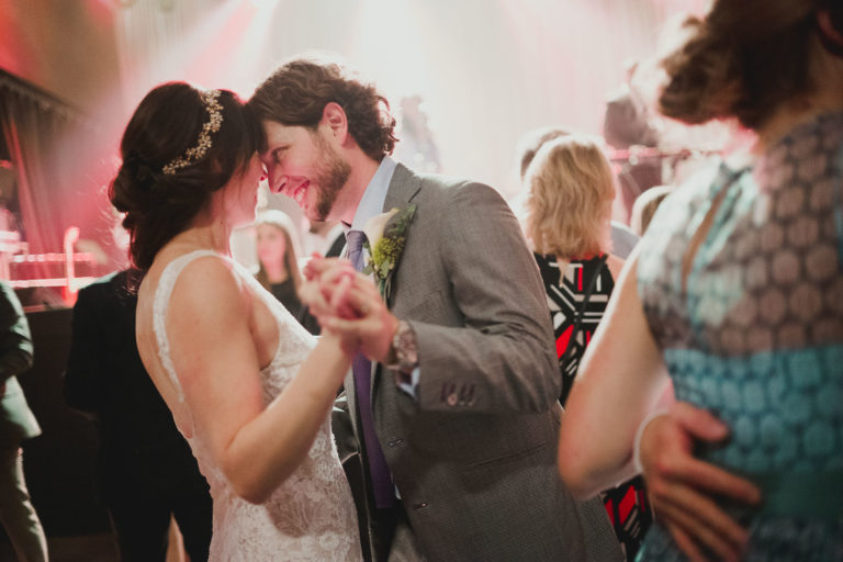 Bride and groom dance with foreheads close White Oak Music Hall Fall Winter -54