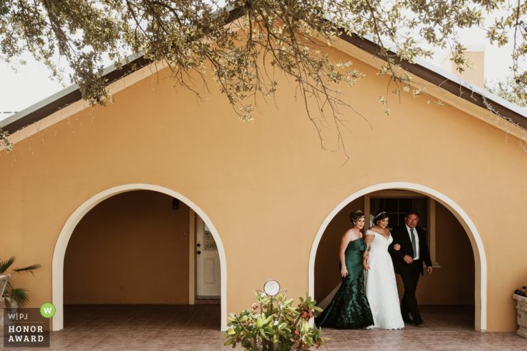 parents of the bride leave the family home in McAllen, Texas on their way to a wedding