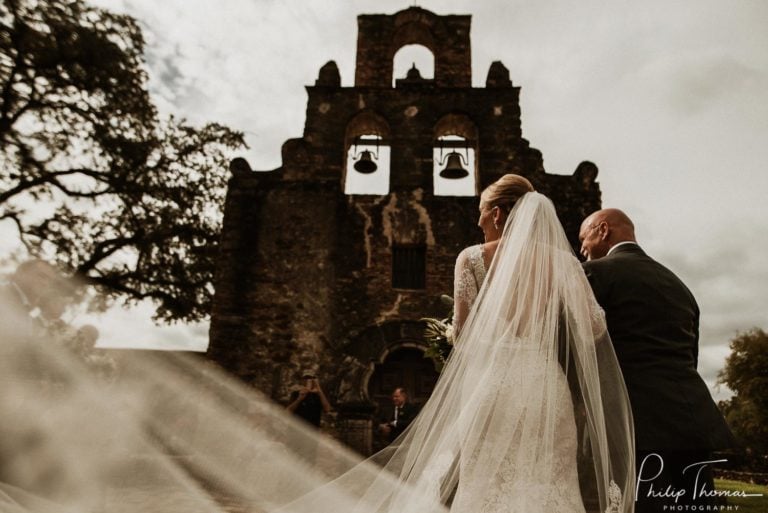 a bride and groom walking Mission Espada San Antonio Reception Omni La Mansion-Reception Omni La Mansion-Philip Thomas PhotographyHouston wedding photographer