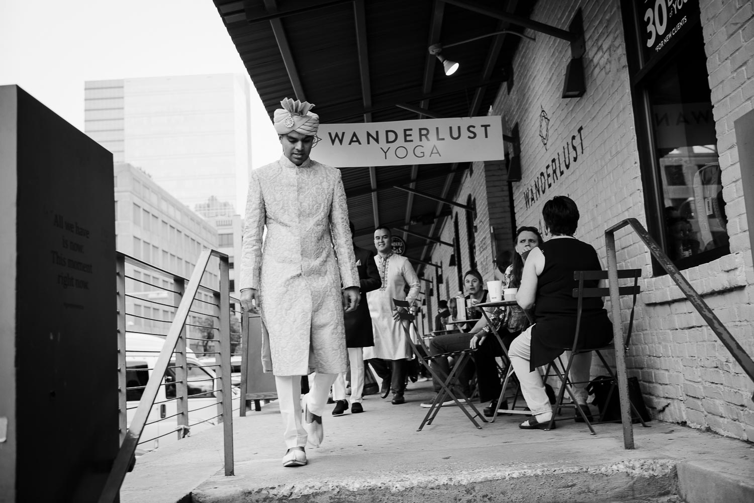 The groom makes his way toward the Baraat at Brazos Hall Austin South Hindu asian wedding ceremony