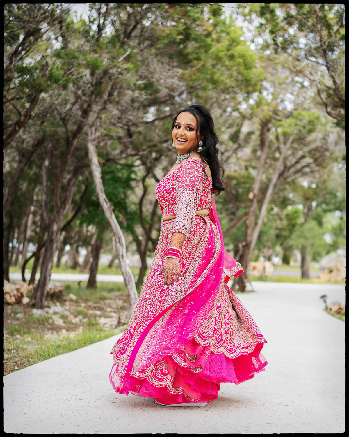 a woman in a pink dress portrait captured before the sangeet celebrations