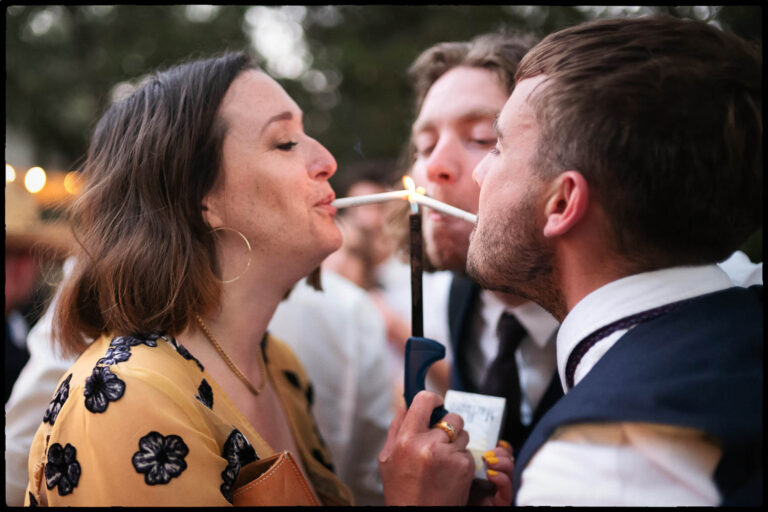 Guests light up cigars in celebration of the couple Texas Hill Country Ranch Wedding - Bri + Joe - American girls meets a Brit-Wedding photographer-Philip Thomas-064 L1000151 Edit 2