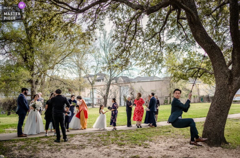 Pre-Ceremony Bliss: Houston Reception Hosts Tree Swing Fun for Guests -WPJA -candid natural wedding image 2730042